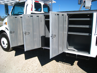 Loaded Sterling Acterra bucket truck with built in tool cabinets.