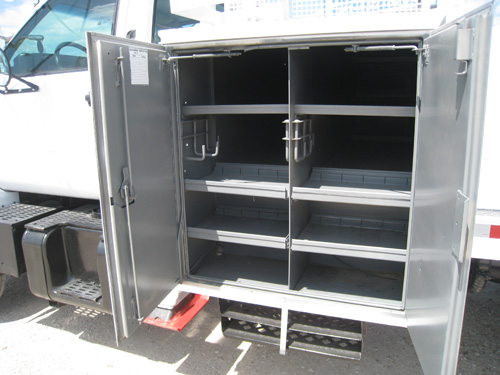 Built in digger truck tool boxes.