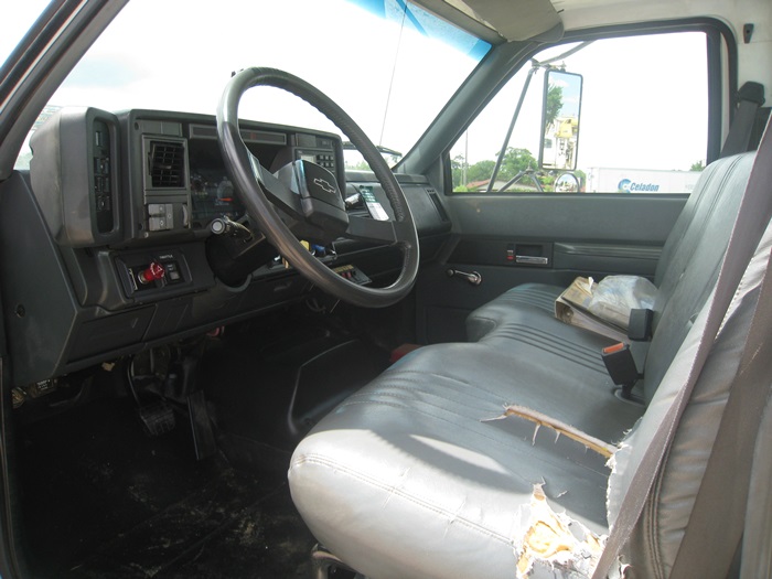 Bench seat digger truck.
