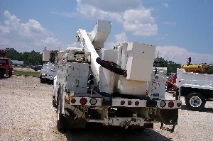 This bucket trucks has a rotating bucket.