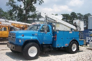 A nice blue Versa-Lift bucket truck.