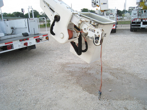 Bucket truck with boom tip winch.