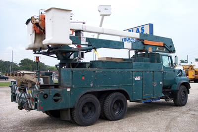 This bucket trucks has over center insulated buckets.