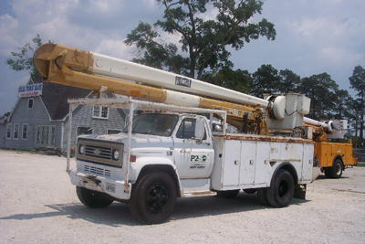 This is a GMC HI-Ranger bucket truck.