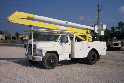 This is a yellow boom bucket truck.