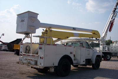 A two man cneter mount bucket truck.