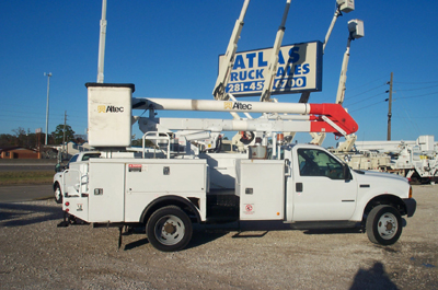 Bucket truck with insulated upper and lower boom.