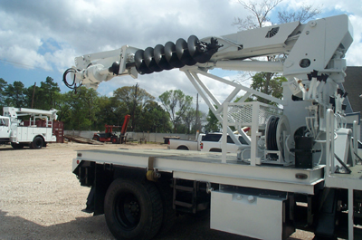 A digger truck with an 18 inch auger.