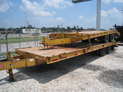 Two orange Belshe Trailers.